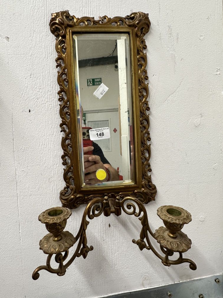 20th cent. Gilt Girondall with bevelled mirrors, a pair.