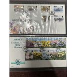 First day and commemorative covers for Jersey, Guernsey, and other Channel Islands in two albums,