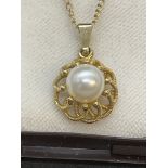 Jewellery: 9ct gold chain (18ins) with a pearl pendant attached, size of cultured pearl 7mm.