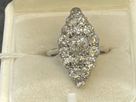 Jewellery: Early 20th cent. Marquise cut graduated diamond ring. The ring and mount test as