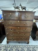 19th cent. Mahogany staircut chest of 2 short and 4 long drawers, on bracket supports.