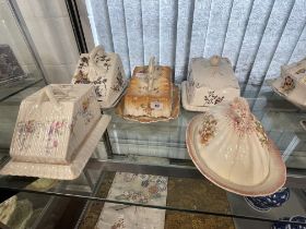 Collection of five large Staffordshire cheese dishes, various designs with floral decoration and