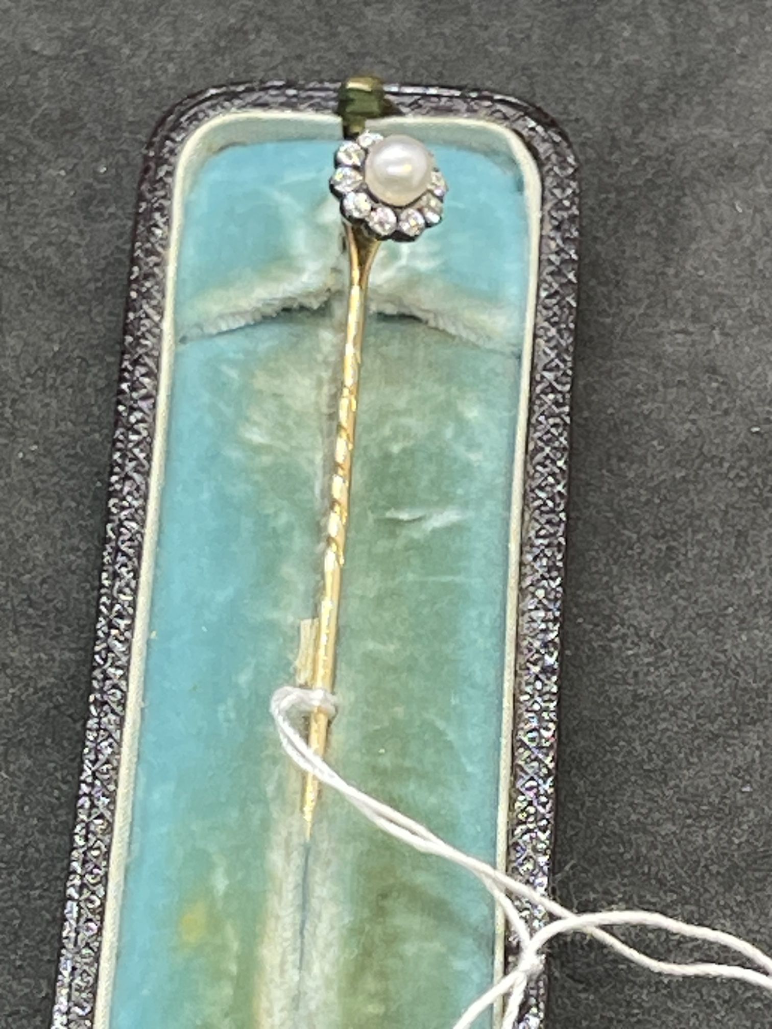 Jewellery: Early 20th century diamond and seed pearl tie pin.