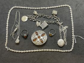 Objects of Virtu/Jewellery: Items of silver jewellery brooch, charm bracelet, necklets.
