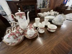 15-piece coffee set, pink flowers by Royal Staffordshire, 18-pice blue and white teaset by