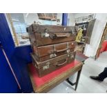 Luggage: Leather suitcases with travel labels