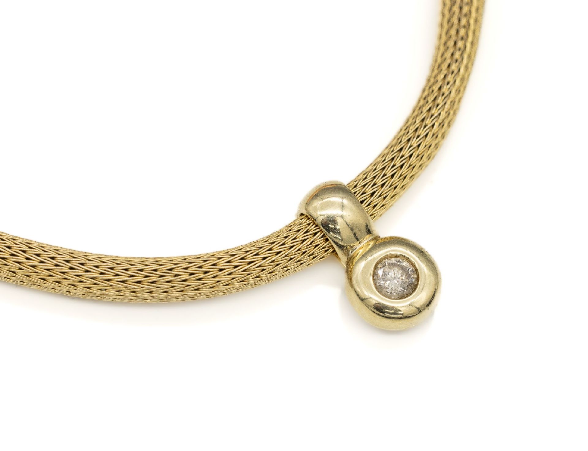 14 kt Gold Brillant-Clipanhänger an Strickcollier, GG