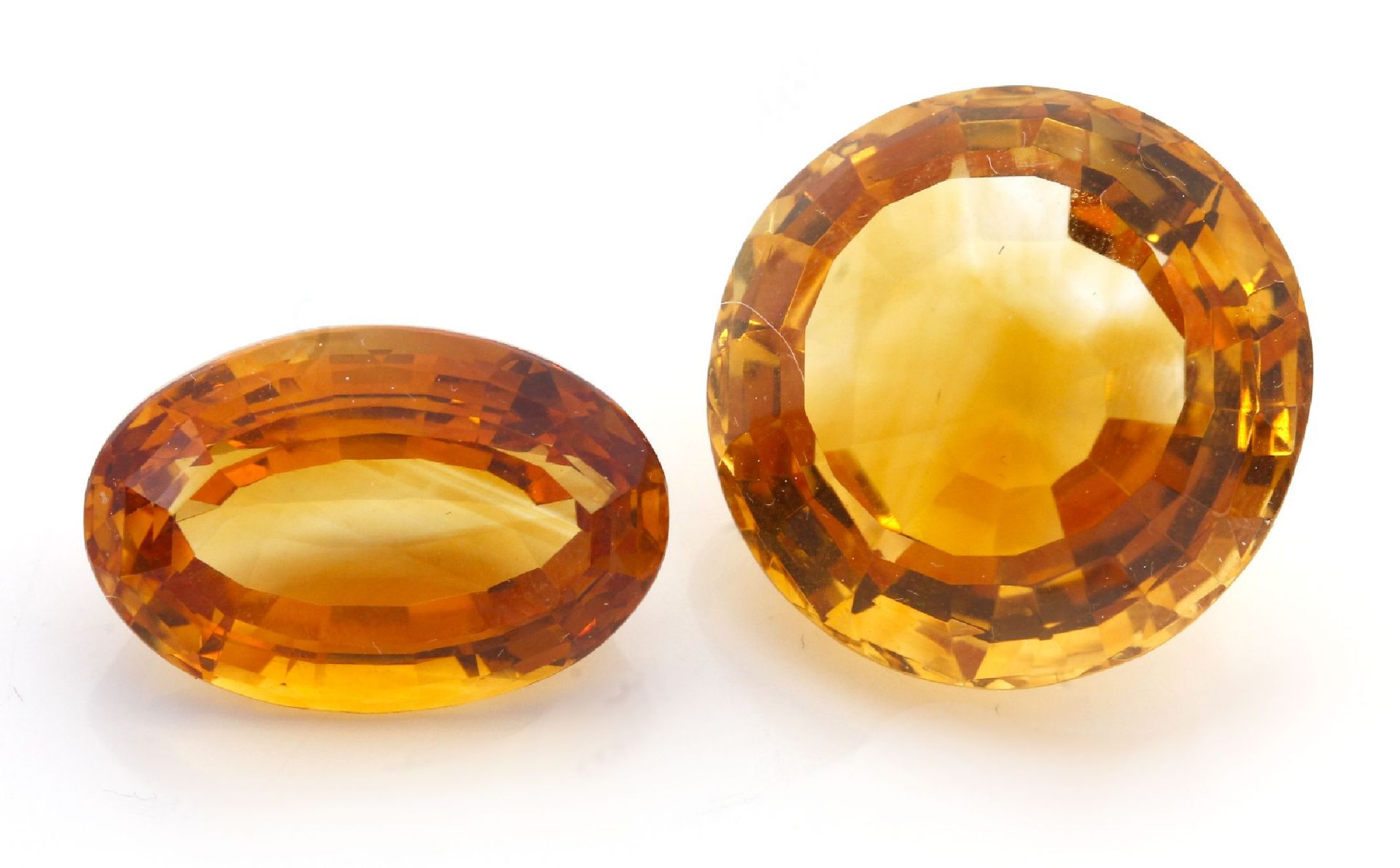 Lot 2 lose Citrine,   rund- und ovalfacett., 39.99 ct