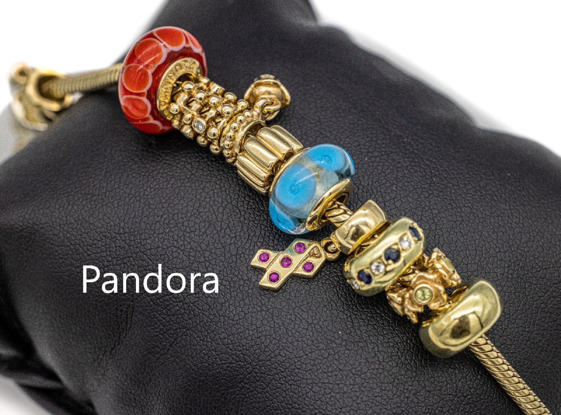 14 kt Gold PANDORA-Armband mit 18 Charms, GG 585/000,