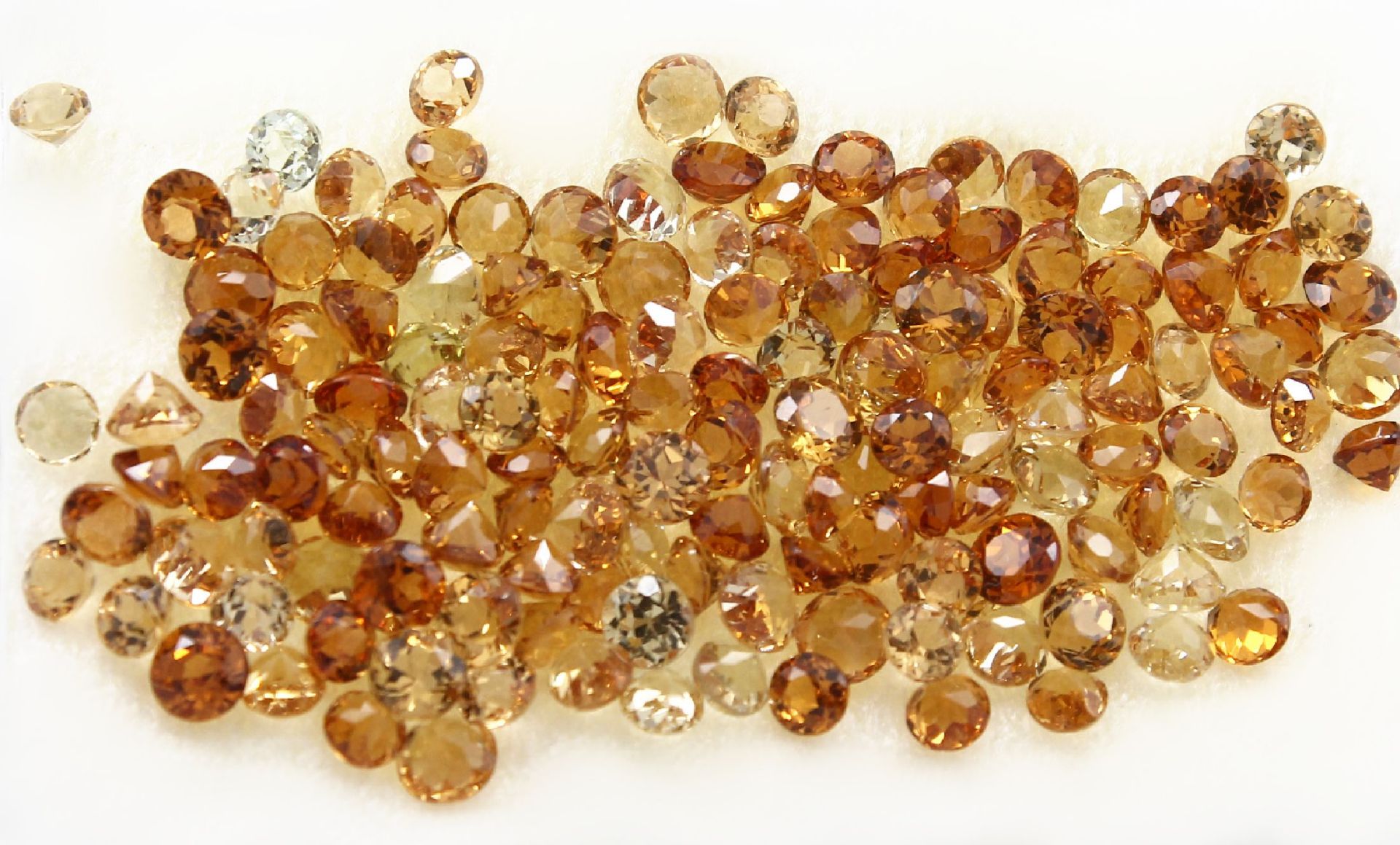 Lot lose Citrine,   ca. 26.21 ct, rundfacett.in versch.