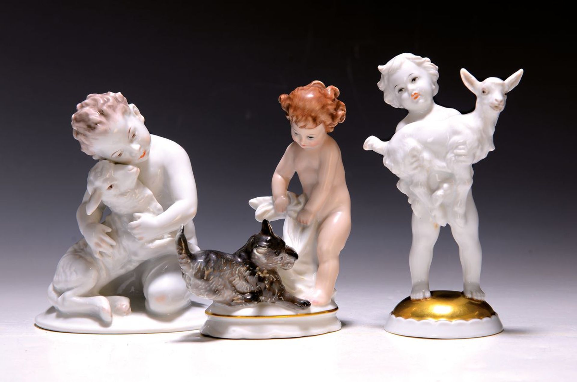 Drei Porzellanfiguren, Rosenthal, 20.Jh.,  Putto mit Lamm,