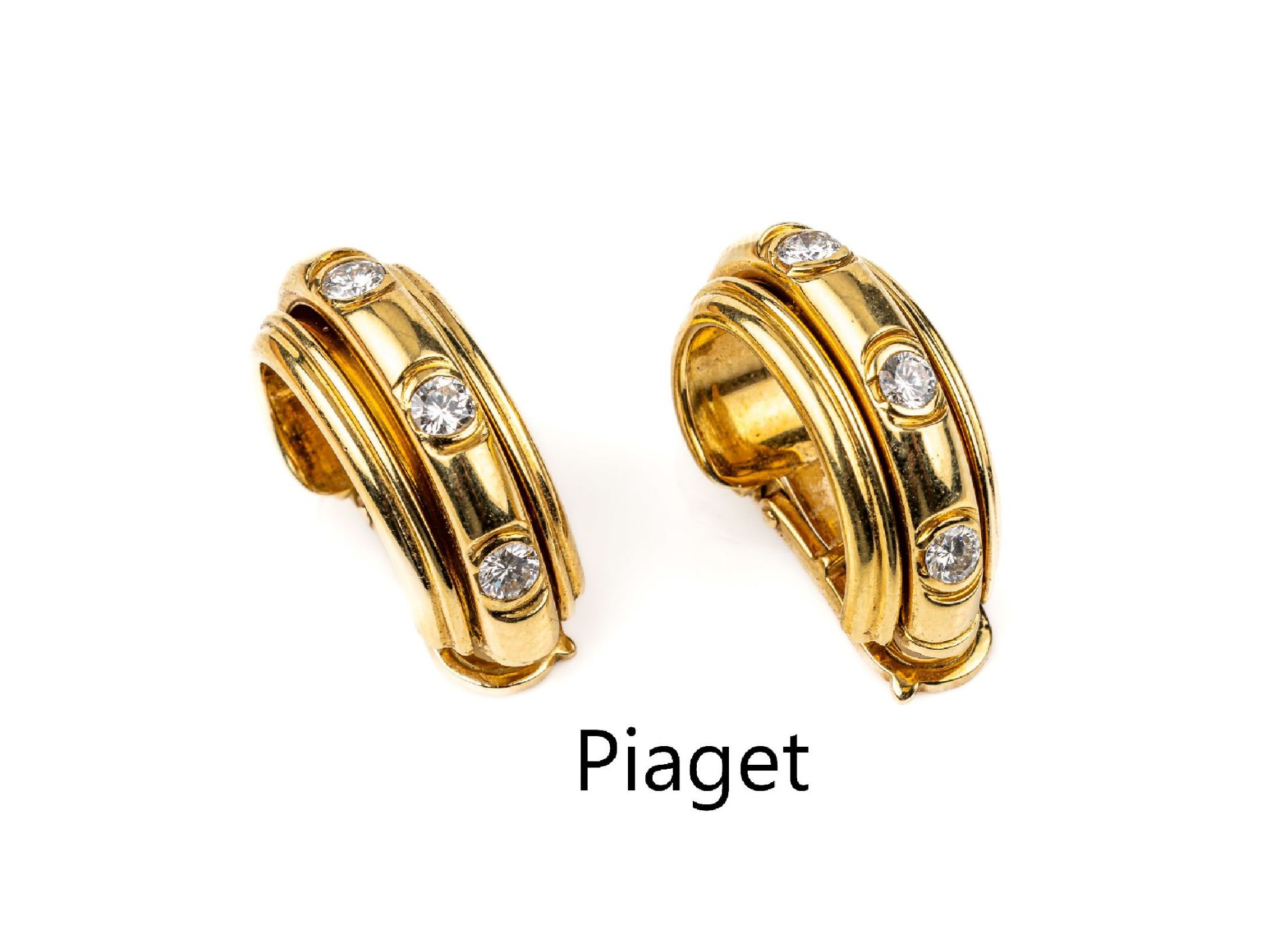 Paar 18 kt Gold PIAGET Brillant-Ohrclips,   GG 750/000,