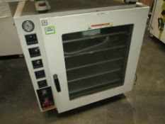 Across Vacuum Oven