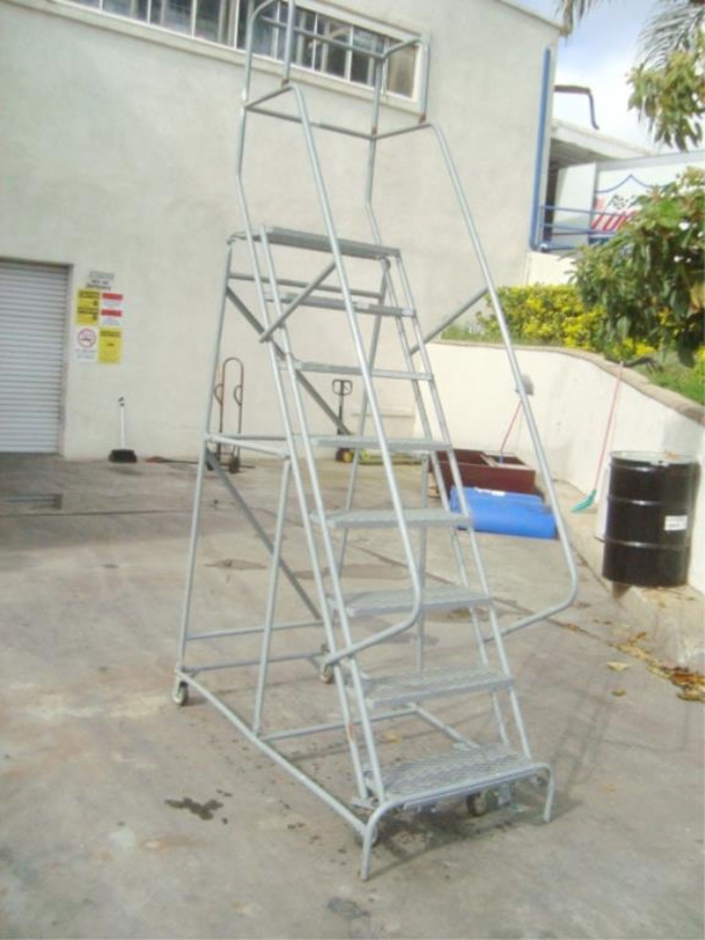Rolling Stockroom Ladder
