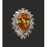 PLATINUM NATURAL FANCY DEEP BROWN-YELLOW DIAMOND AND DIAMOND RING (GIA CERTIFICATE)