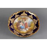 SÈVRES PORCELAIN DISH SIGNED 'PORCELAINES D'ART A. GOLSE' DECORATED WITH GOLD RIM FEATURING TWO LADI