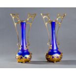 A PAIR OF BOHEMIAN IRIDESCENT GLASS VASES WITH GILT METAL MOUNTS, CIRCA 1900