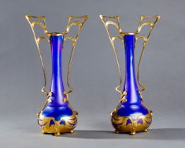 A PAIR OF BOHEMIAN IRIDESCENT GLASS VASES WITH GILT METAL MOUNTS, CIRCA 1900