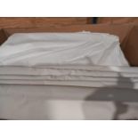 A Box Of White Bed Linen