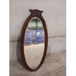 An Oak Oval Mirror