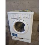 An Indesit Washing Machine (Distressed)