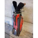 12 Golf Clubs & Driver In Red/Black Golf Bag