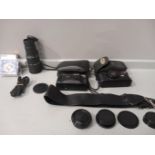 Box Including 2 Canon Cameras, Lens, Camera Straps, Lens Cover Etc