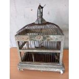 An Antique Wooden Bird Cage