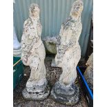 A Pair Of Stoneware Statues