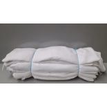 Bundle Of White Bed Linen