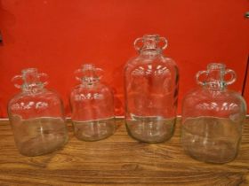 4 Demi Johns & 2 Coloured Glass Bowls