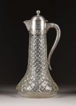 A LARGE SILVER-MOUNTED CUT-GLASS DECANTER