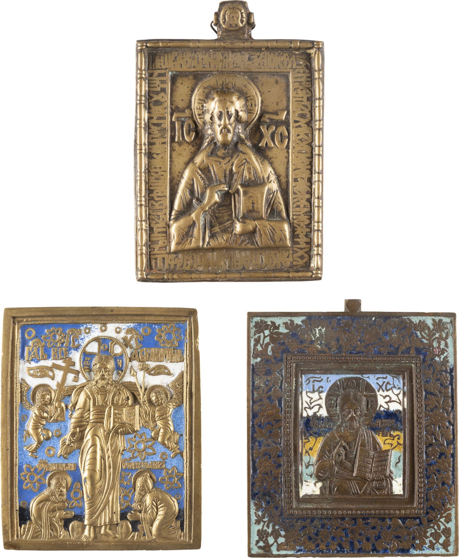THREE BRASS AND ENAMEL ICONS SHOWING CHRIST PANTOKRATOR AND CHRIST OF SMOLENSK