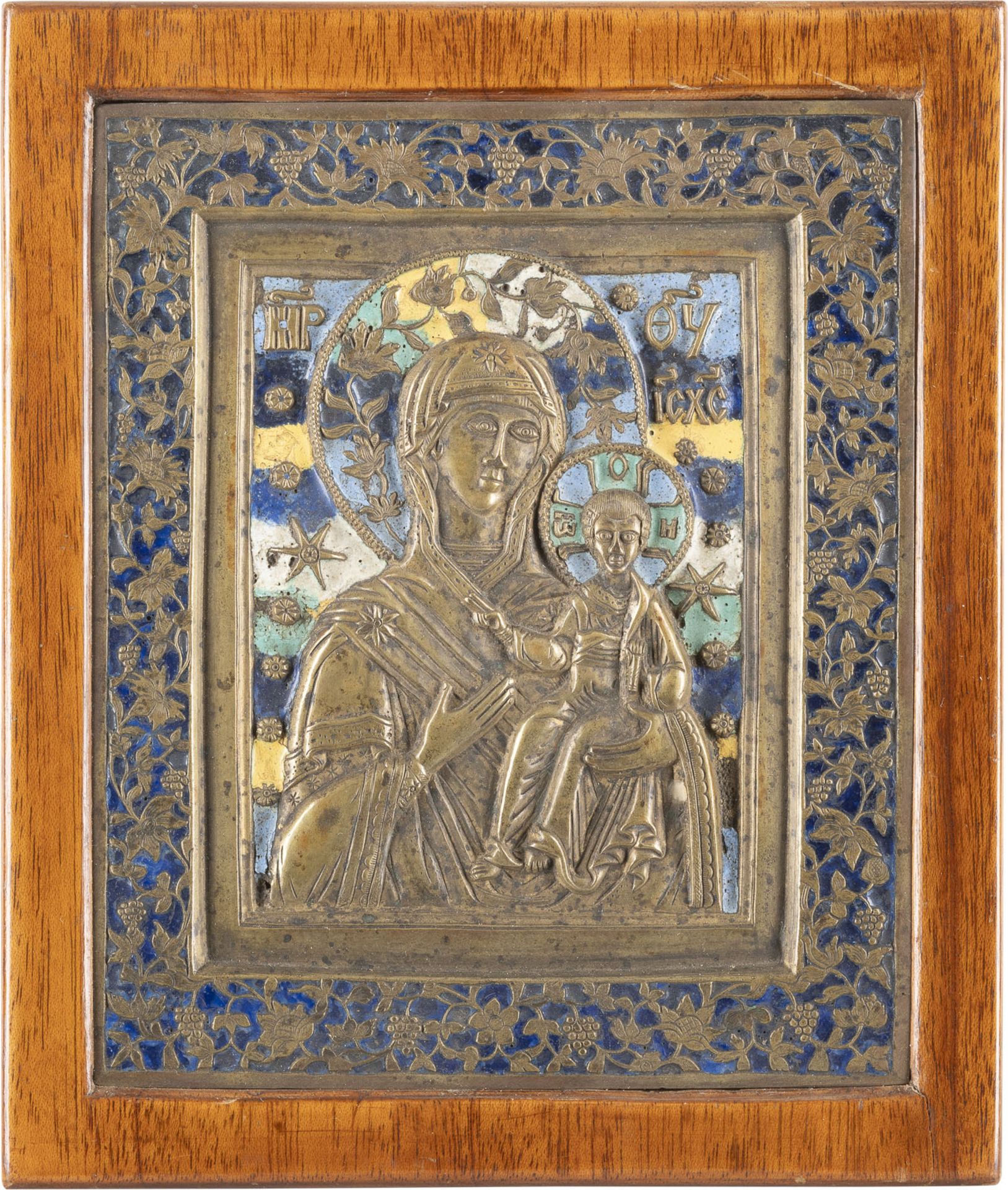 A LARGE BRASS AND ENAMEL ICON SHOWING THE SMOLENSKAYA MOTHER OF GOD