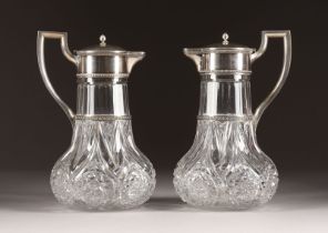 A PAIR OF SILVER-MOUNTED CUT-GLASS DECANTERS