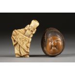 EIN NETSUKE VON FUKUROKUJU AUS HIRSCHHORN UND EIN NETSUKE EINES WEIBLICHEN GESICHTES AUS TAGUANUSS