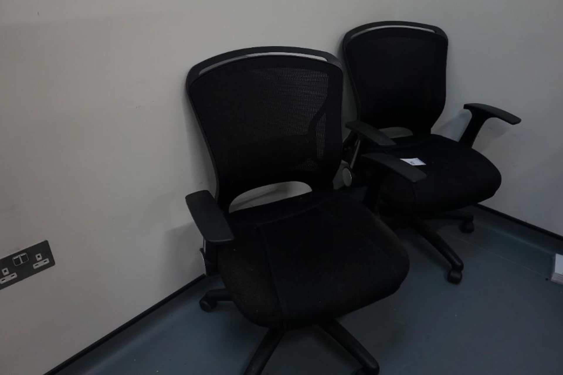2x black office chairs
