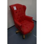 Red swivel office chair