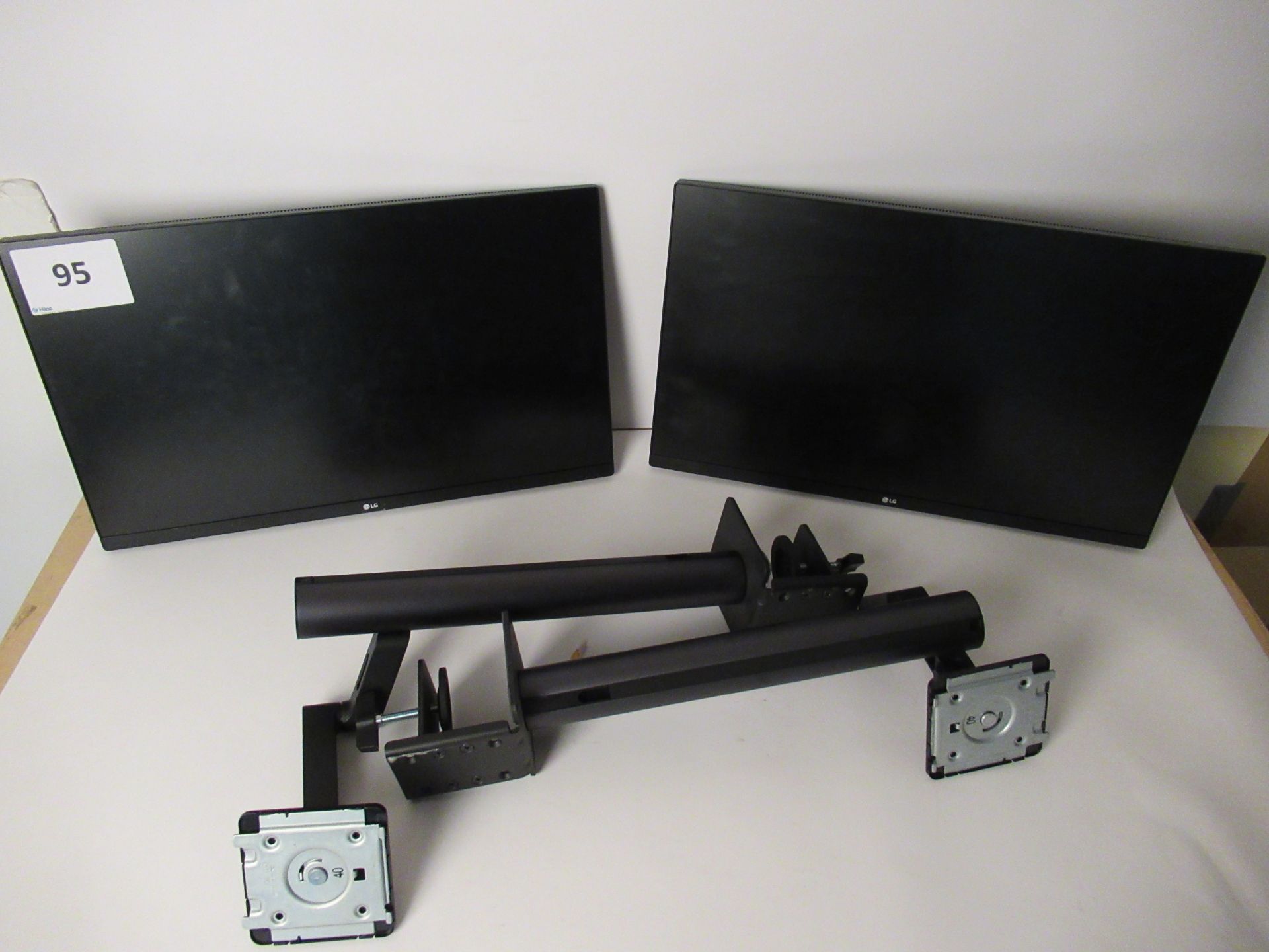 2 LG 27QN880 27 inch Flatscreen Monitors with Desk Arms, without Power leads