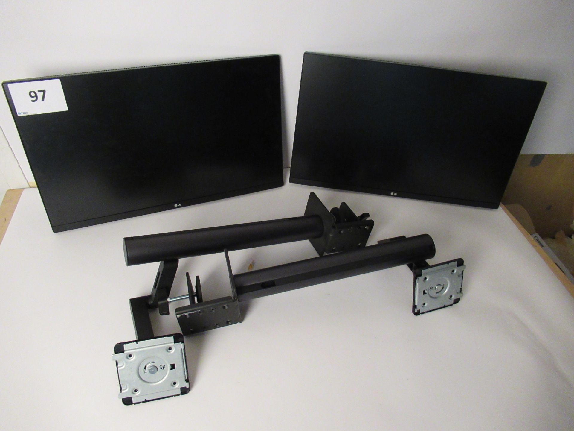 2 LG 27QN880 27 inch Flatscreen Monitors with Desk Arms, without Power leads