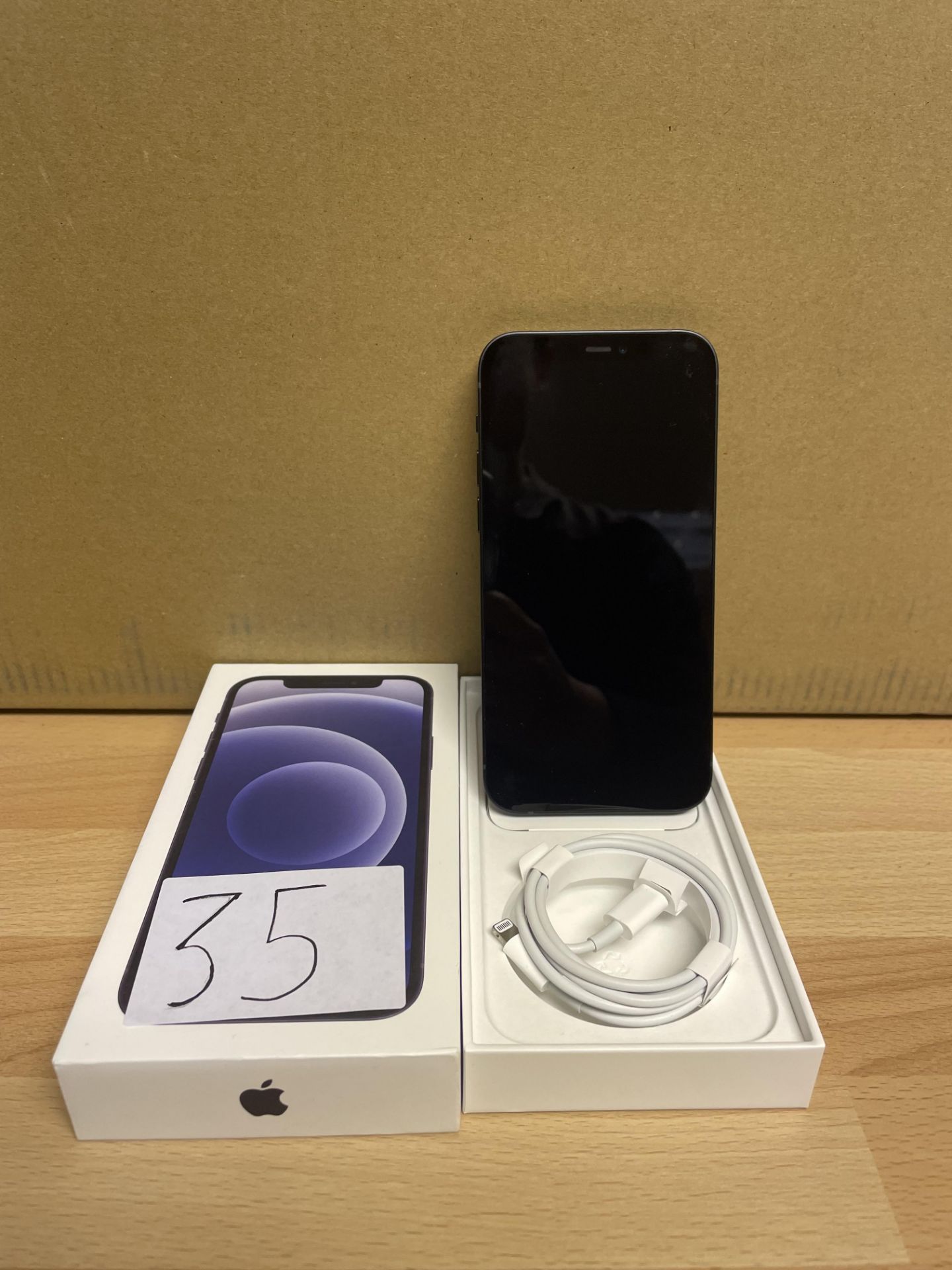 Apple, iPhone 12, Comes with charging cable and box, Serial Number FFYGX42D0F0X