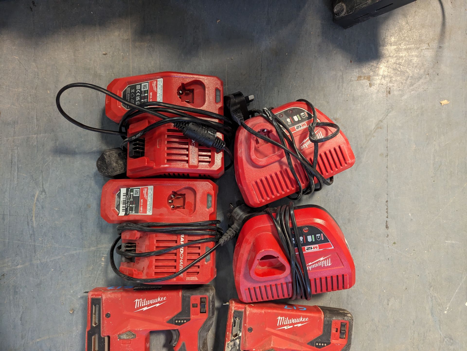 (10) Milwaiukee M12 BST Cordless Staple Guns with (4) Chargers and (8) Batteries - Image 3 of 3