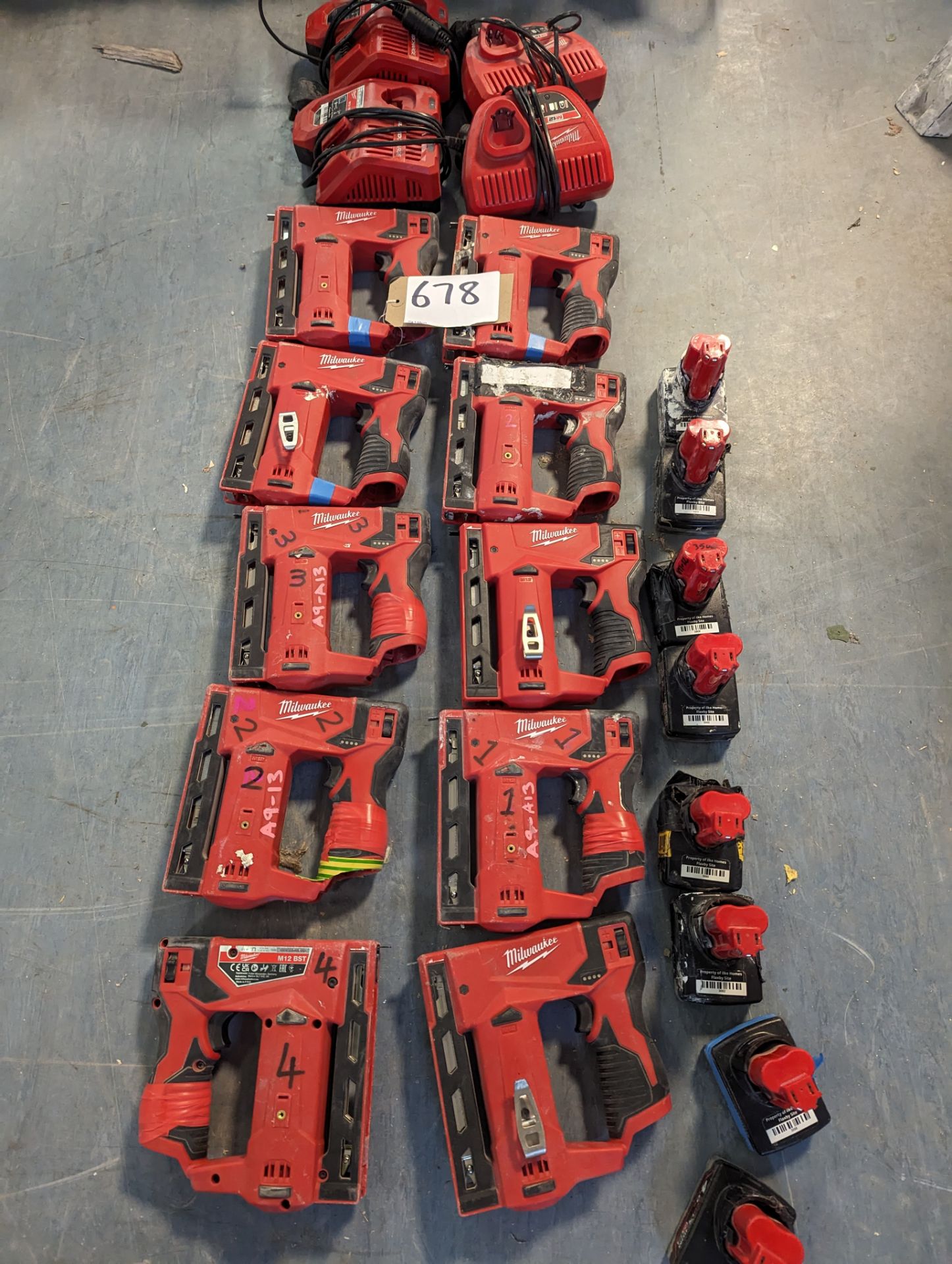(10) Milwaiukee M12 BST Cordless Staple Guns with (4) Chargers and (8) Batteries - Image 2 of 3