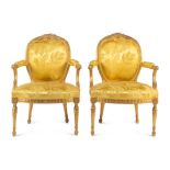 A Pair of George III Carved Giltwood Armchairs