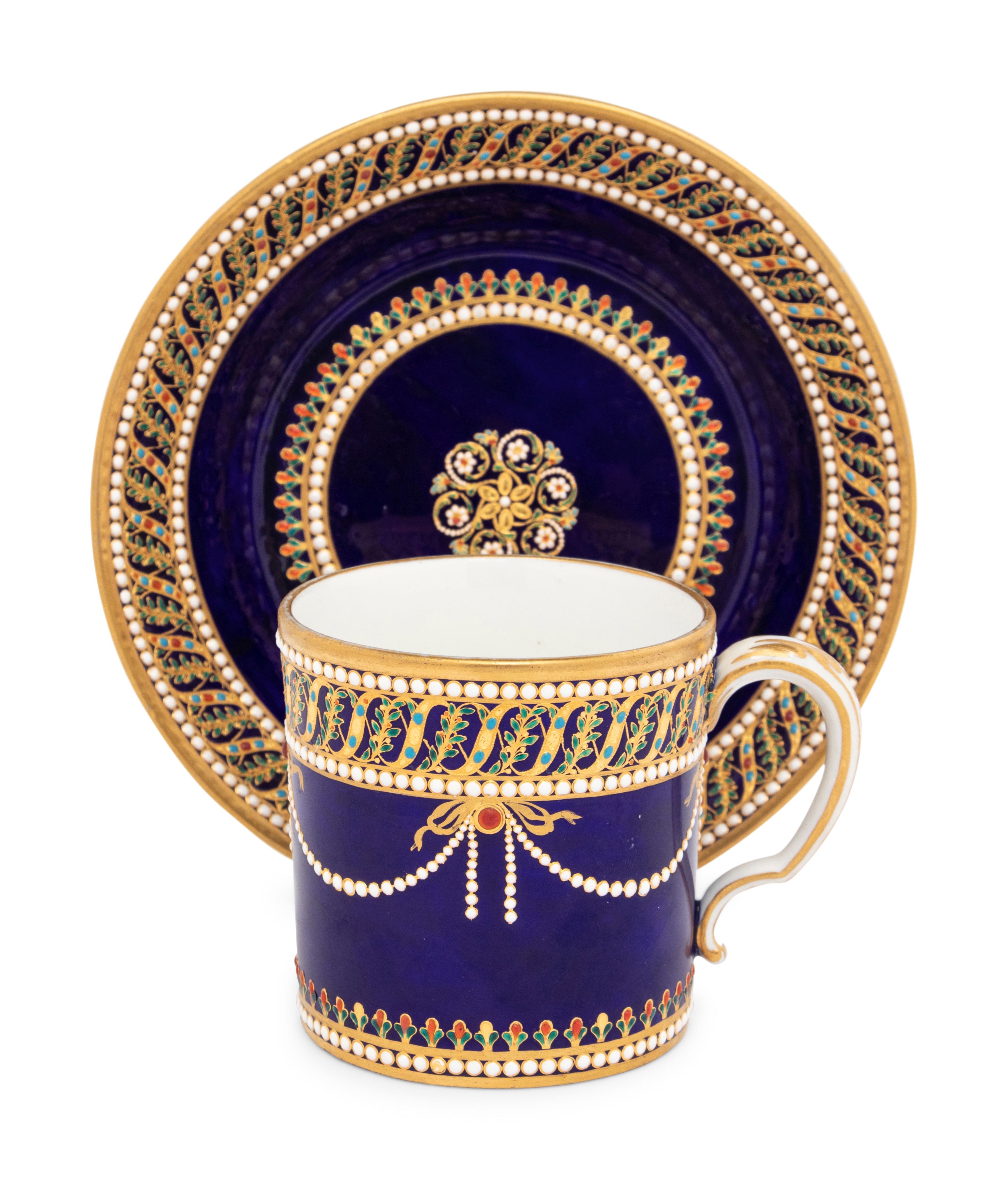 A Sevres Partially Beau Bleu Jewelled Porcelain Coffee Can and Saucer (Gobelet 'Litron' et sa Soucou
