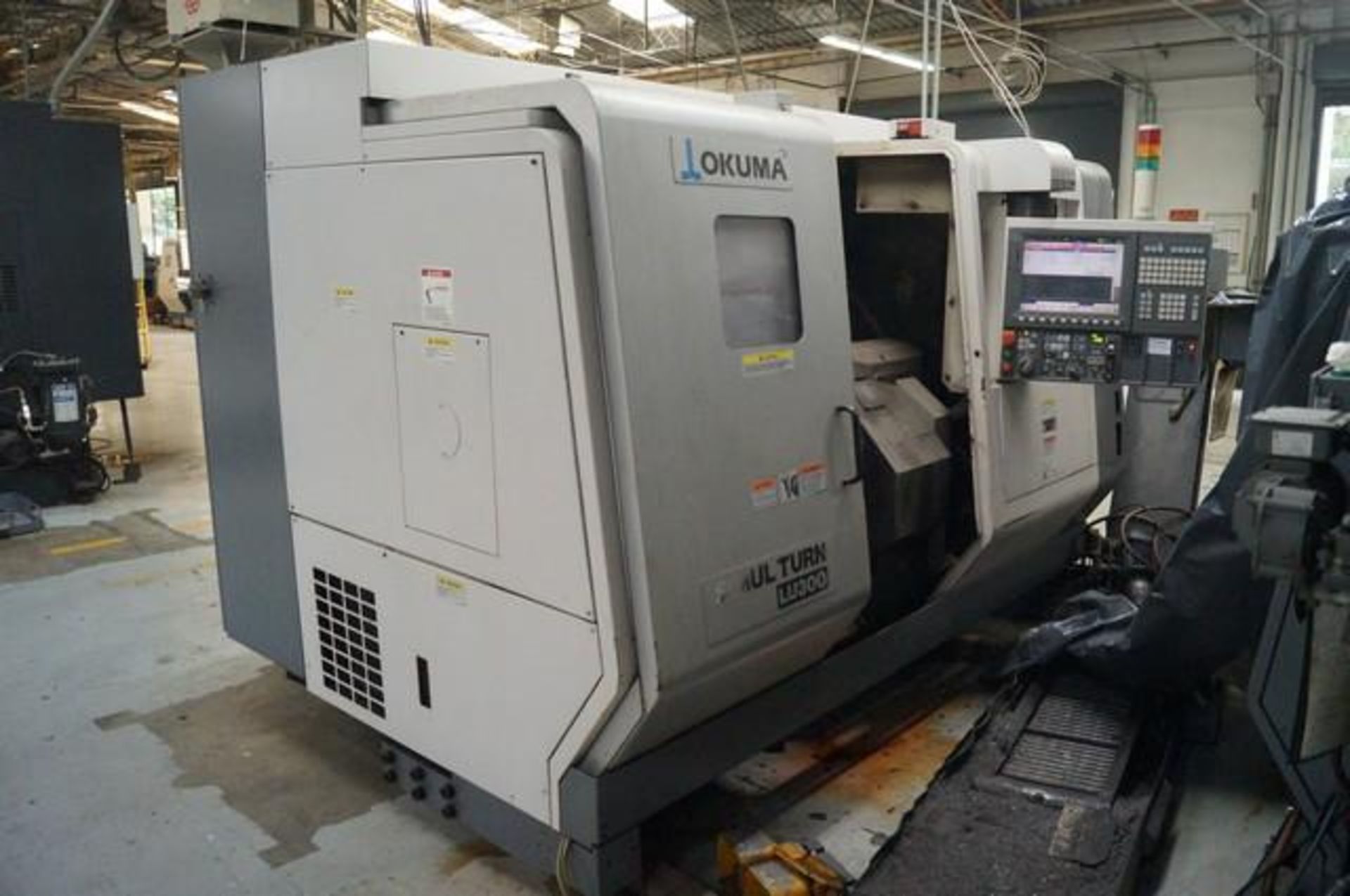 2011 OKUMA LU-300-2SC Twin Turret CNC Horizontal Turning Center