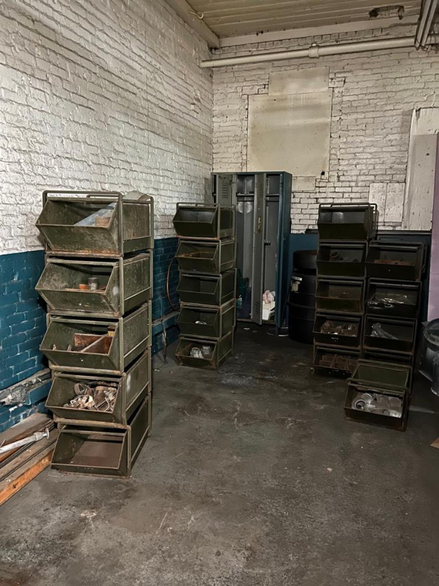 (1) Lot bins with assorted pipe fitting, shut off valves and copper fittings, Located At 32 Mill St,