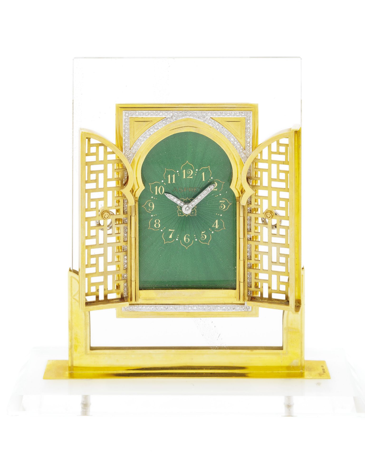 Asprey, clock desk 18K gold and rock cristal set with round brillant cut diamonds. the moucharabieh