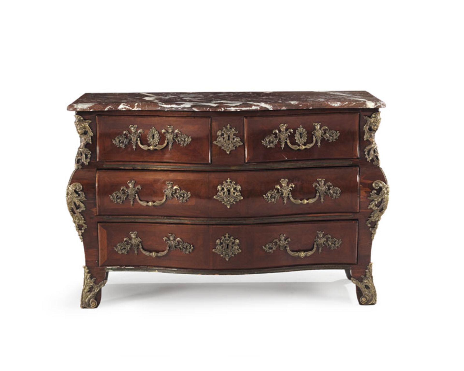 Commode tombeau d'époque Régence, en placage de bois de violette, façade galbée ouvrant par quatre t