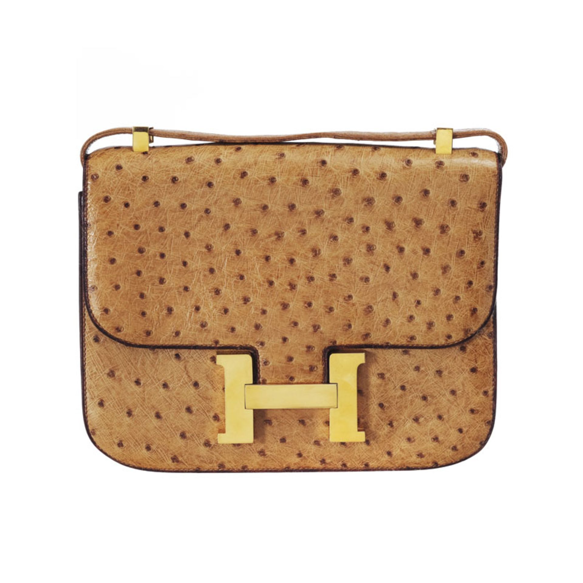 Hermès, sac Constance en peau d'autruche Gold, année 1981, bouclerie plaquée or, housse,18x23 cm